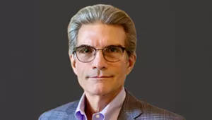 Denis headshot thumbnail